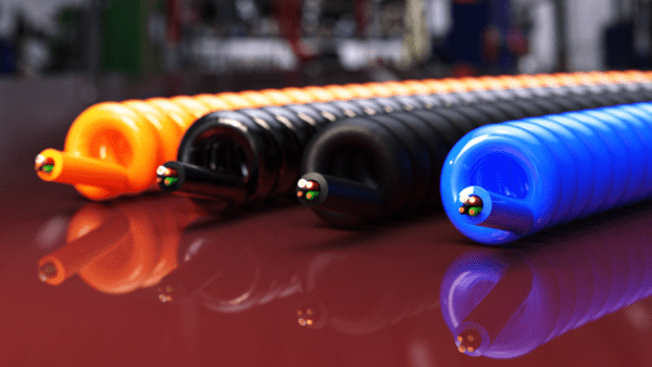 Retractable Coil Cord for Cable Management and Mobility